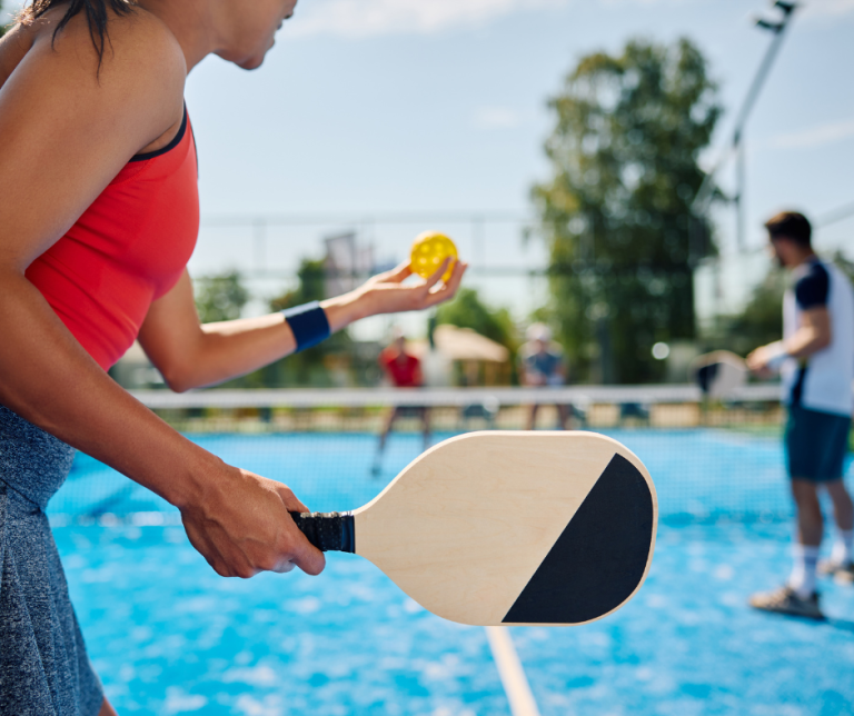 woman playing pickleball